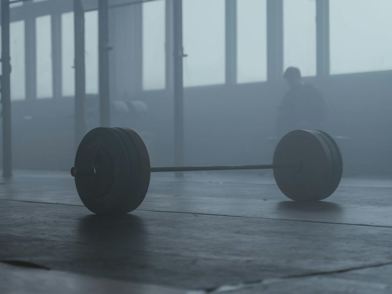Atmospheric photo of a modern dark gym interior